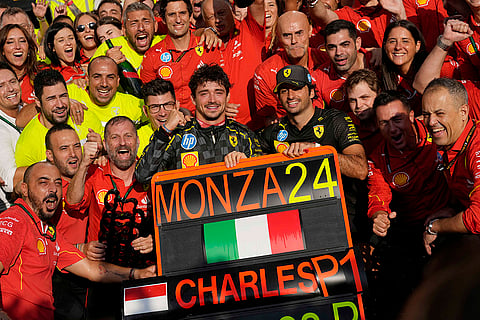 Italian Grand Prix 2024: Ferrari driver Charles Leclerc celebrates with his teammate Ferrari driver Carlos Sainz in the Ferrari garage